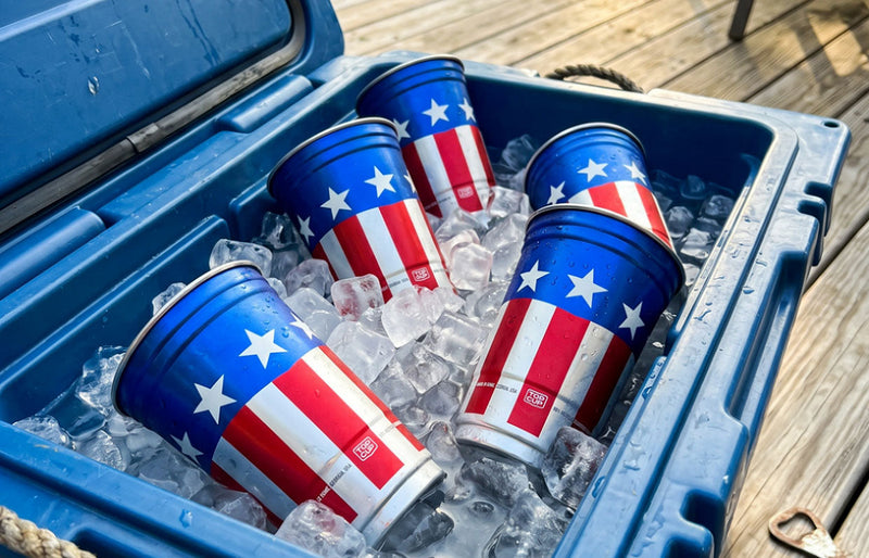 Top Cup America 250th cups on ice in a cooler