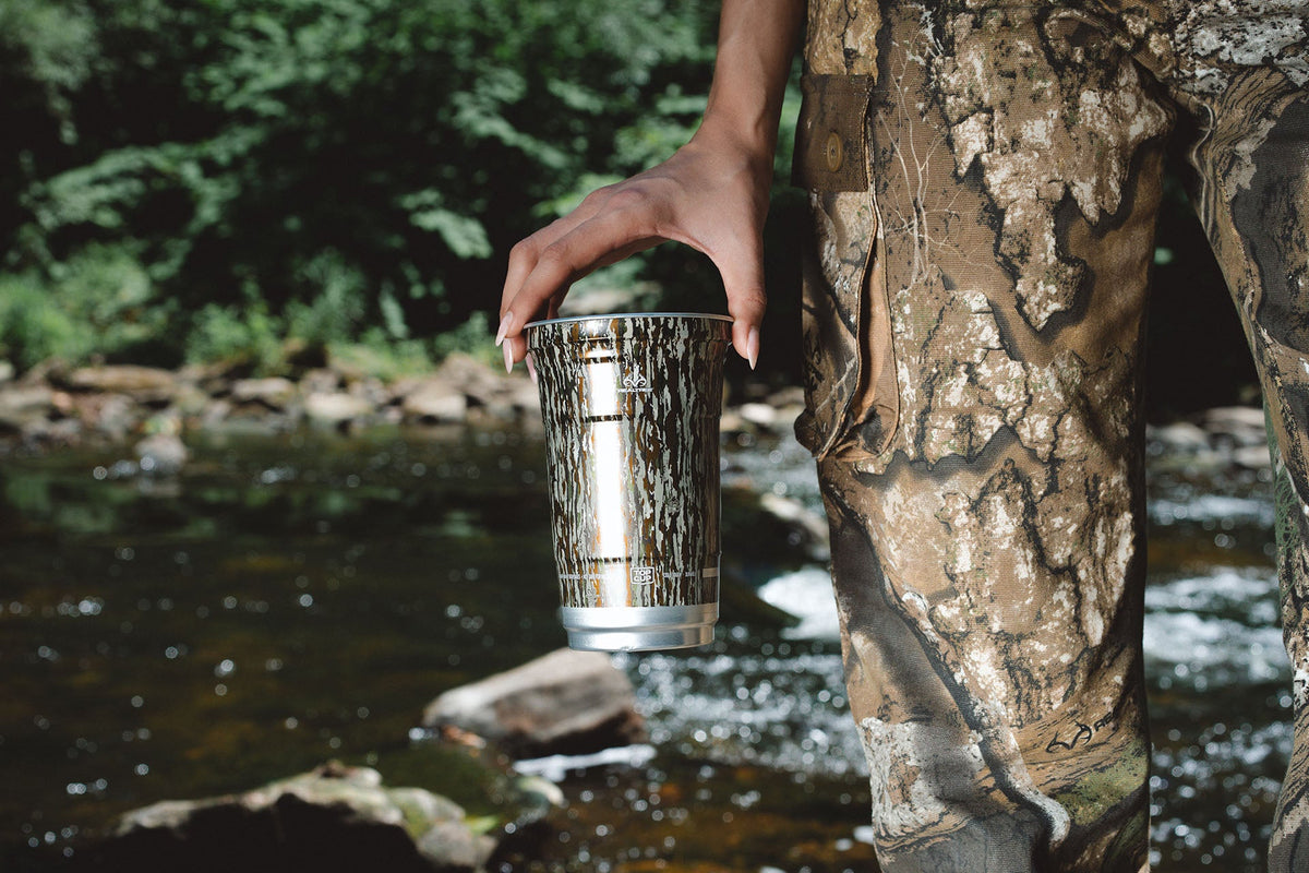 Realtree Top Cup camping kitchen setup at a campsite